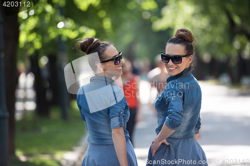 Image of twin sister with sunglasses