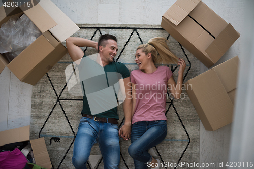 Image of Top view of attractive young couple