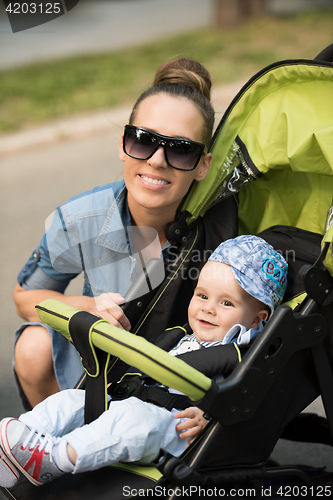 Image of mother and baby in the park