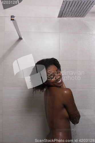 Image of African American woman in the shower