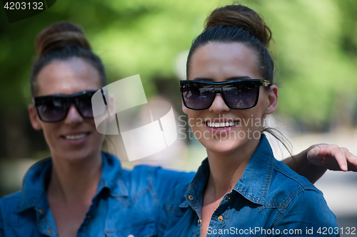 Image of twin sister with sunglasses