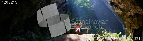 Image of Photo of buddhist temple in mountain cave