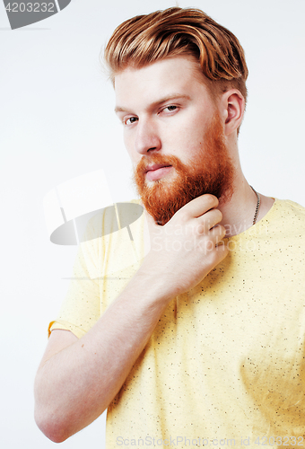 Image of young handsome hipster ginger bearded guy looking brutal isolated on white background, lifestyle people concept