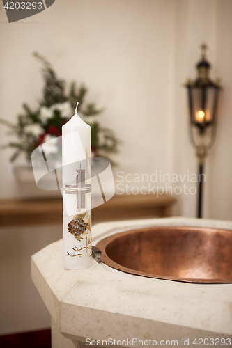 Image of Baptismal candle on font