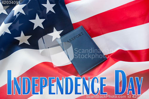 Image of independence day words, american flag and passport