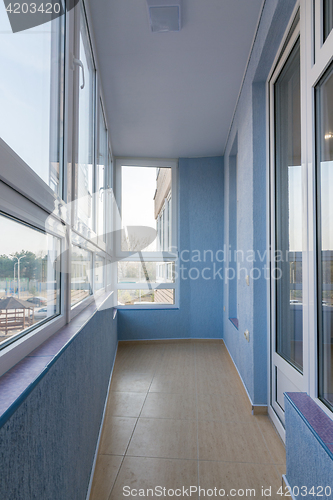Image of Interior renovated balcony of multistory apartment house