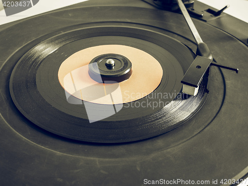 Image of Vintage looking Vinyl record on turntable