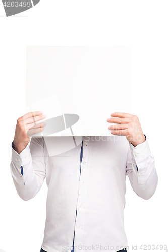 Image of close up of man hands showing white blank board