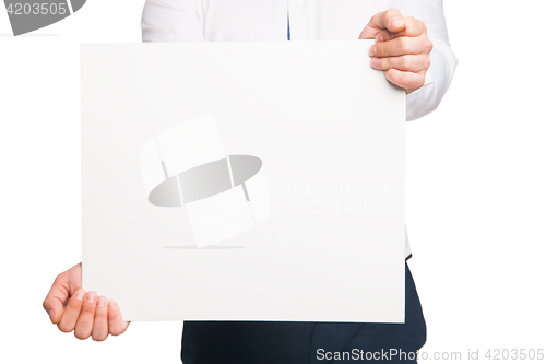 Image of close up of man hands showing white blank board