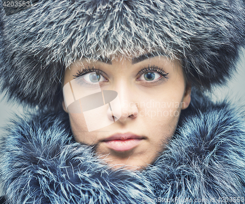 Image of young woman in fur