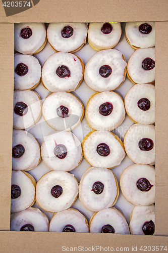 Image of Assorted different Delicious donuts in a box