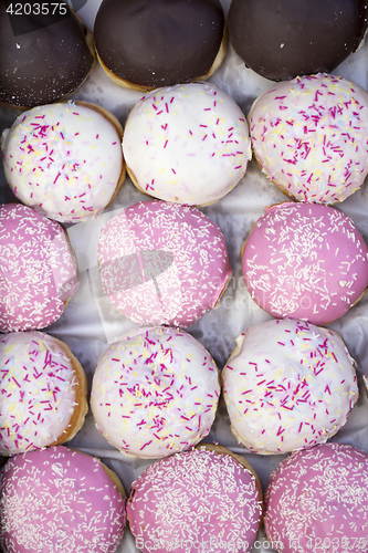 Image of Assorted different Delicious donuts in a box