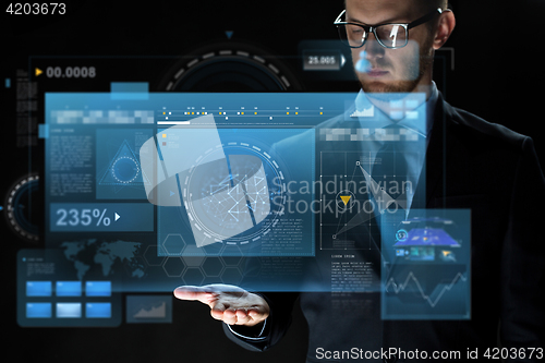 Image of close up of businessman with virtual screens