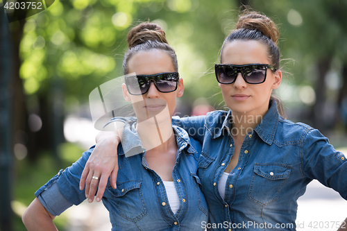 Image of twin sister with sunglasses