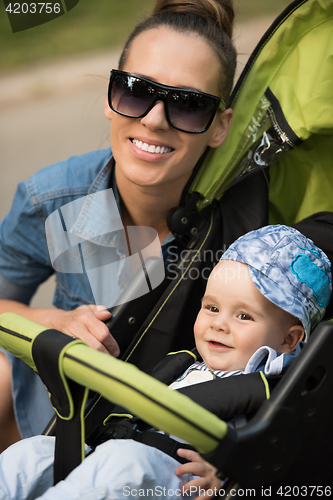 Image of mother and baby in the park