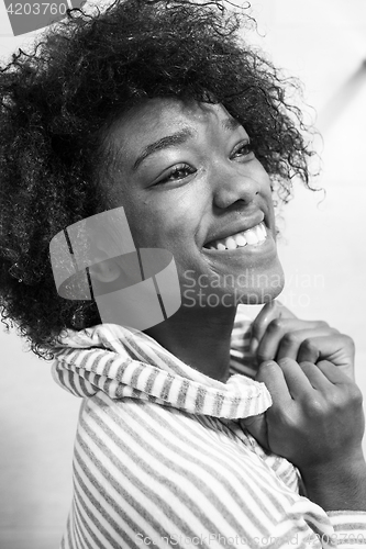 Image of beautiful black woman wearing  bathrobe