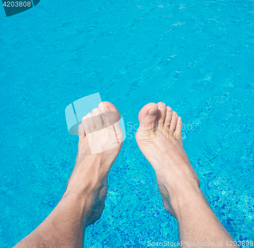 Image of legs in the water