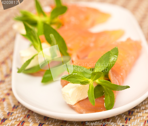 Image of appetizers with red fish