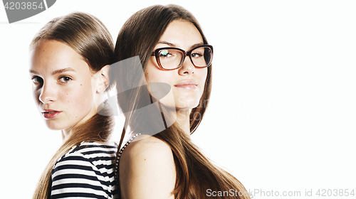 Image of two young workers isolated on white, same dresses in strip