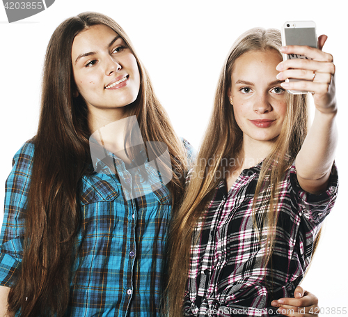 Image of cute teenage girls making selfie isolated