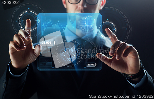 Image of close up of businessman touching virtual screen