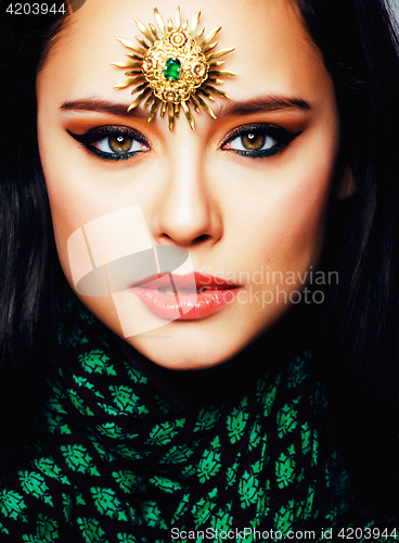 Image of beauty eastern real muslim woman with jewelry close up, bride wi