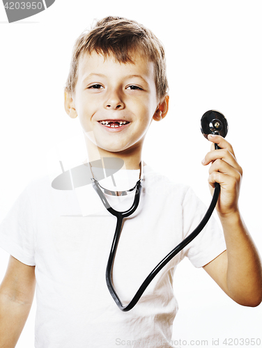 Image of little cute boy with stethoscope playing like adult profession d