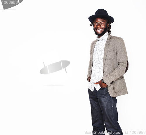 Image of young handsome afro american boy in stylish hipster hat gesturin