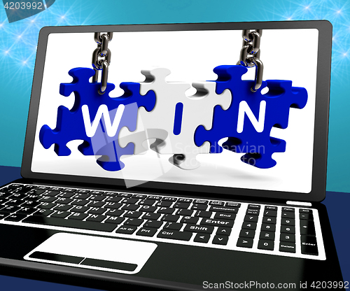 Image of Win On Laptop Shows Online Gaming Champion
