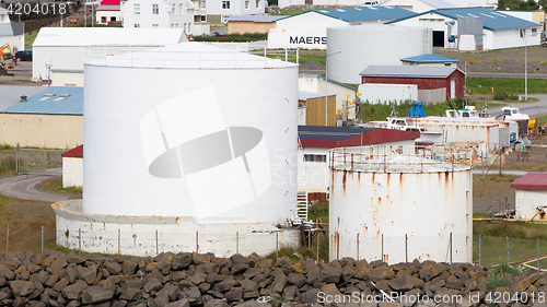 Image of AKRANES, ICELAND - July 27, 2016: White gas storage tank in the 