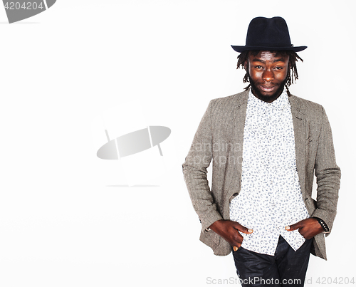 Image of young handsome afro american boy in stylish hipster hat gesturin