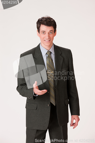 Image of Young Emotional Man In A Business Suit