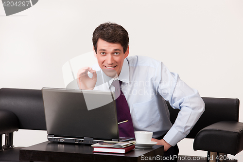 Image of Young Man And Computer