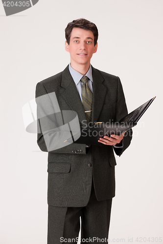 Image of Young Emotional Man In A Business Suit