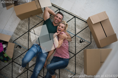 Image of Top view of attractive young couple