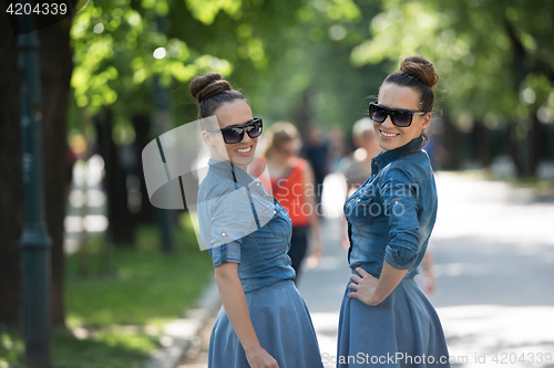 Image of twin sister with sunglasses