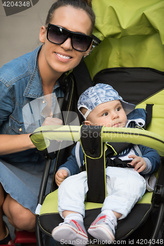 Image of mother and baby in the park