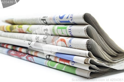 Image of Newspapers folded and stacked