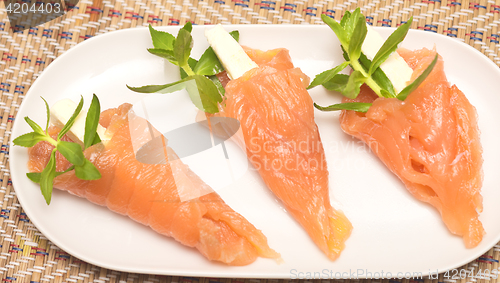 Image of appetizers with red fish