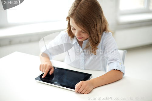 Image of happy student girl with tablet pc at school