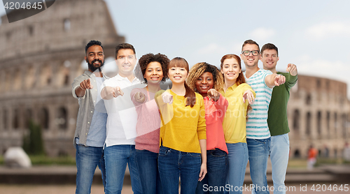 Image of international group of people pointing on you