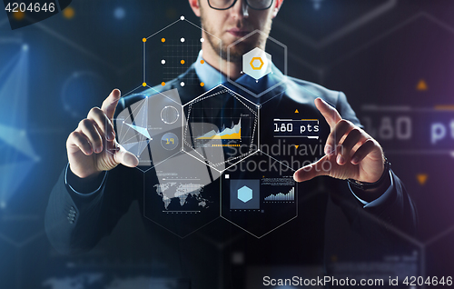 Image of close up of businessman touching virtual screen