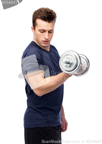 Image of sportive young man with dumbbell