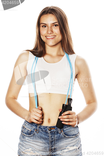 Image of young pretty woman with skipping rope isolated on white