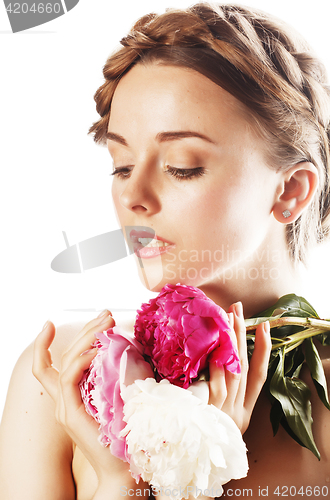 Image of young beauty woman with flower peony pink closeup makeup soft te