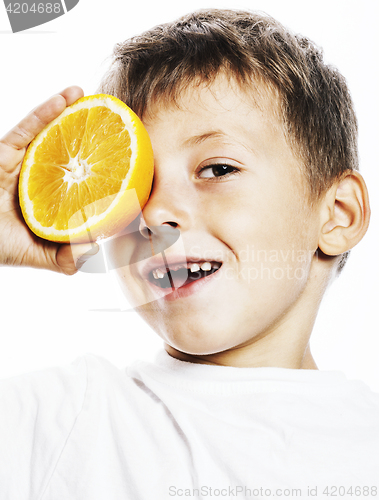 Image of little cute boy with orange fruit double isolated on white smili