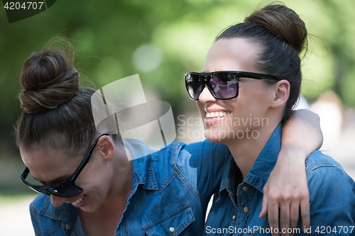 Image of twin sister with sunglasses