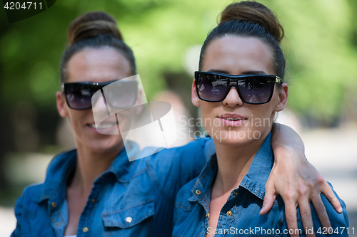 Image of twin sister with sunglasses