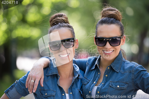 Image of twin sister with sunglasses