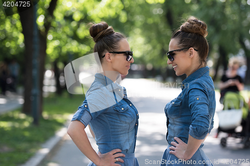 Image of twin sister with sunglasses